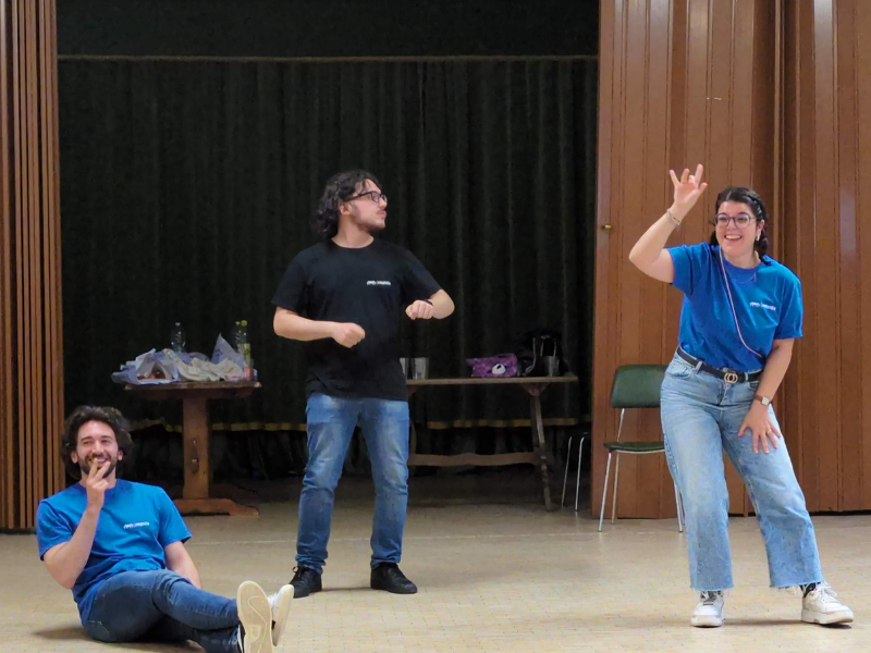 Three Nephila team members acting out an improvised scene.